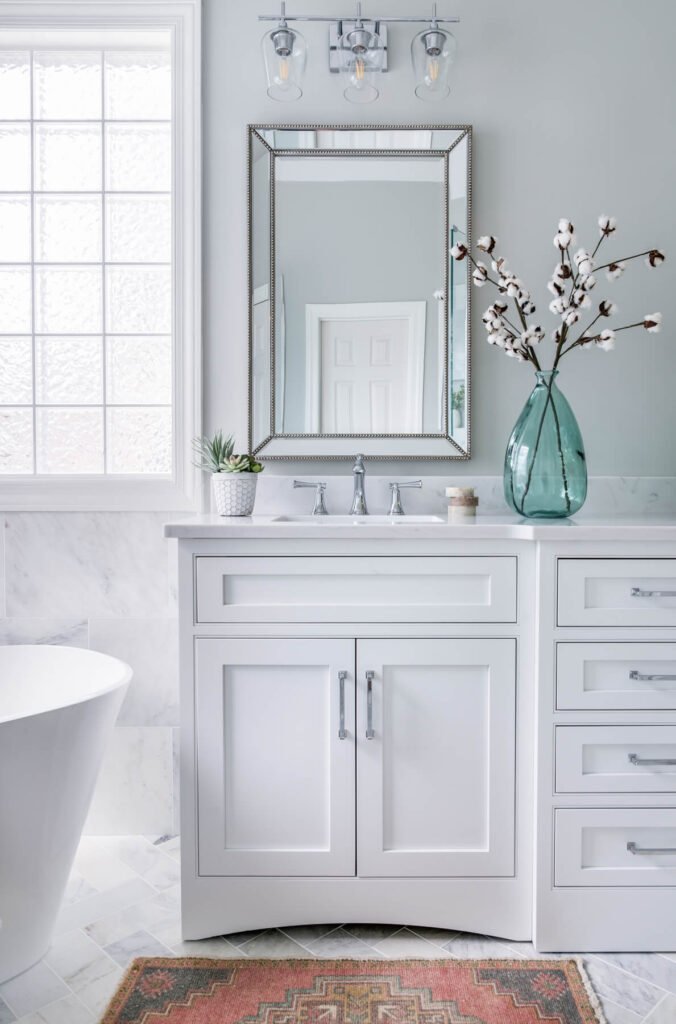 Custom white bathroom vanities with mirrors above